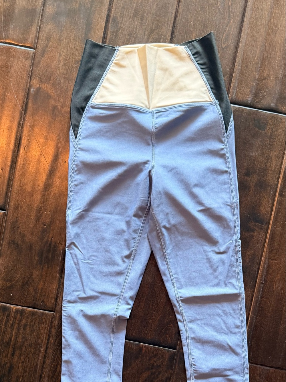 Carbon 38 high rise, 26” length blue leggings. Black and tan waist. Size xs
